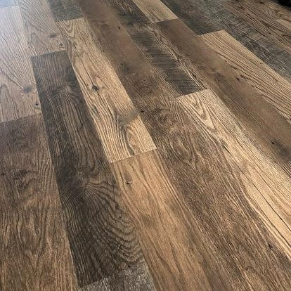 Outlast+ Southport Oak 12 mm T x 6.1 in. W Waterproof Laminate Wood Flooring (16.1 sqft/case)