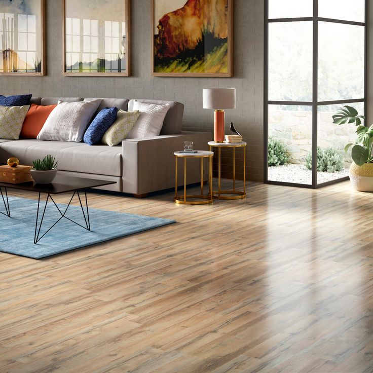 Style Selections Tavern Oak 7.59-in W x 4.23-ft L Embossed Wood Plank Laminate Flooring