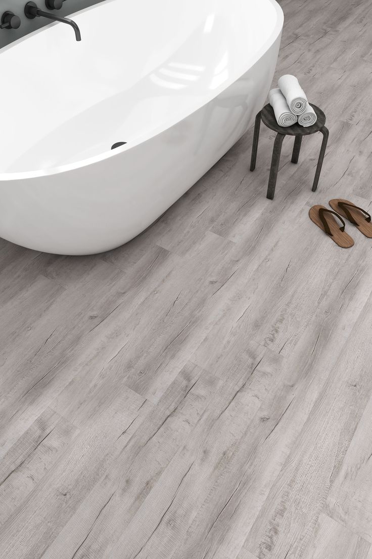 Style Selections Charleston Oak 12-mil x 7-in W x 48-in L Water Resistant Interlocking Luxury Vinyl Plank Flooring