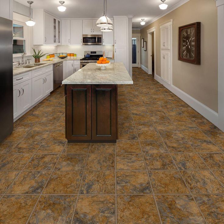 TrafficMASTER Ashlar 12 in. W x 36 in. L Luxury Vinyl Tile Flooring (24 sq. ft. / case)