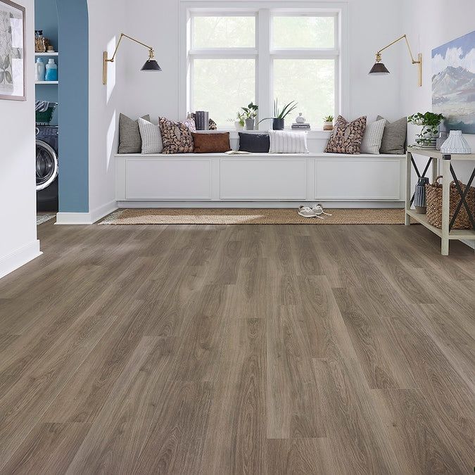 STAINMASTER PetProtect Hastings Point Oak 12-mm T x 7-1/2-in W x 47-1/4-in L Waterproof Wood Plank Laminate Flooring (22.09-sq ft / Carton)
