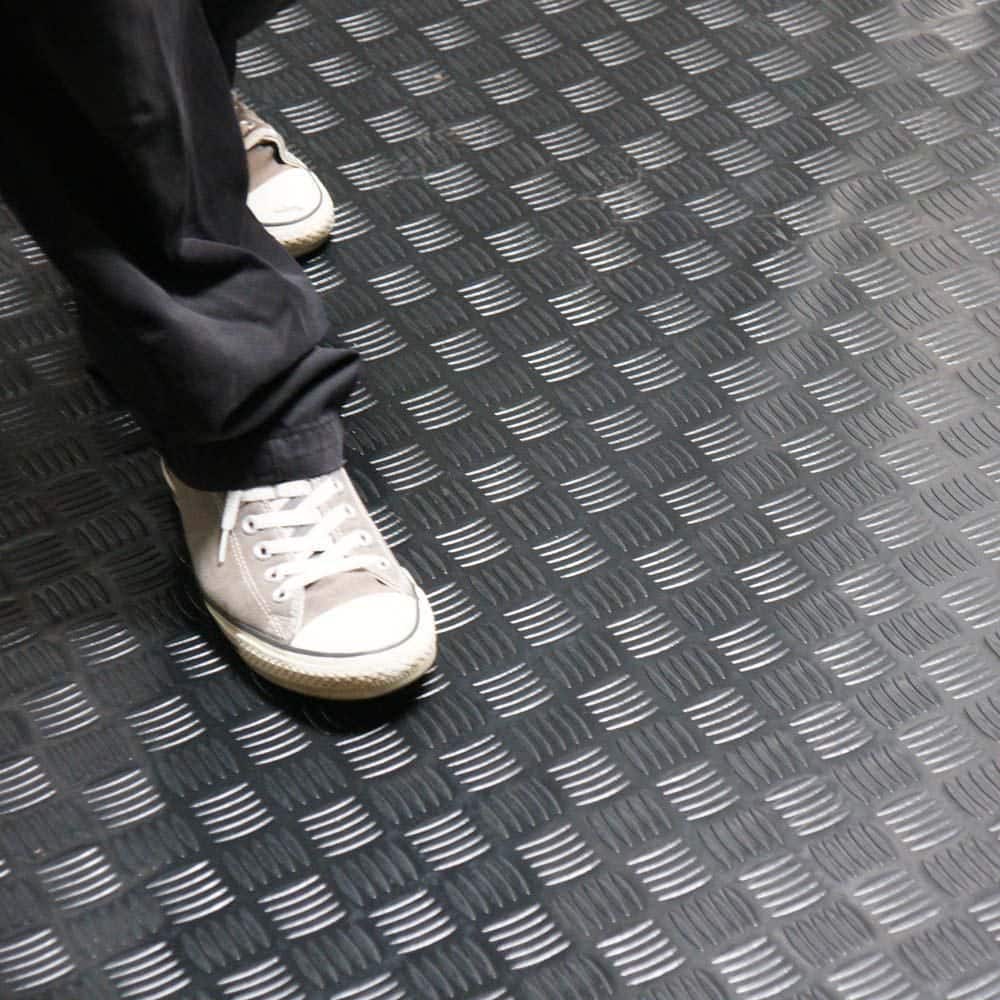 Rubber-Cal "Diamond-Grip" 4 ft. x 20 ft. Black Commercial PVC Flooring