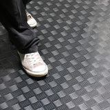 Rubber-Cal "Diamond-Grip" 4 ft. x 20 ft. Black Commercial PVC Flooring