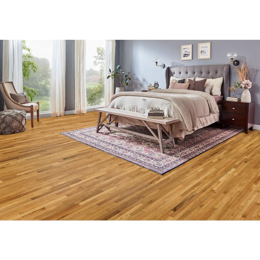 Bruce American Home Butterscotch Oak 3/4 in. T x 2-1/4 in. W Smooth Solid Hardwood Flooring (20 sq.ft./ctn)
