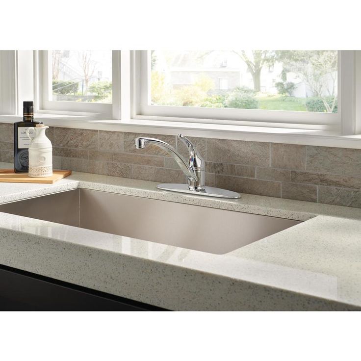 Delta Foundations Chrome 1-Handle Deck-Mount Low-Arc Handle Kitchen Faucet (Deck Plate Included)