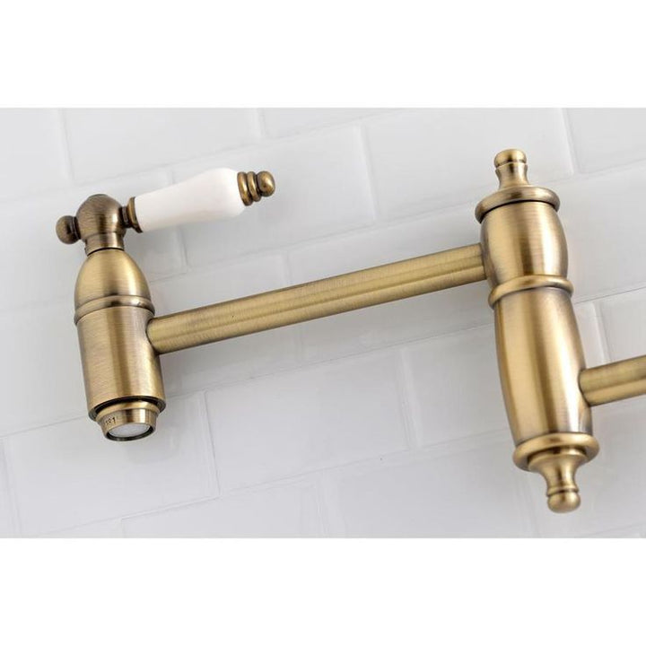 Kingston Brass Restoration Antique Brass 2-Handle Wall-Mount Pot Filler Handle Kitchen Faucet