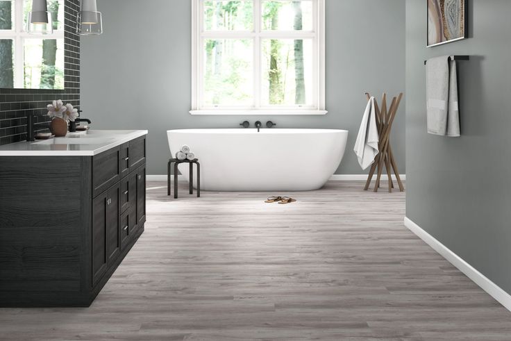 Style Selections Charleston Oak 12-mil x 7-in W x 48-in L Water Resistant Interlocking Luxury Vinyl Plank Flooring