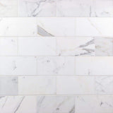 Ivy Hill Tile Calacatta 4 in. x 8 in. x 9mm Polished Marble Subway Tile (25 pieces / 5.55 sq. ft. / box)