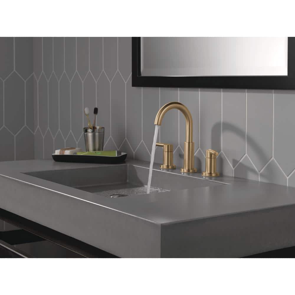 Nicoli J-Spout 8 in. Widespread Double Handle Bathroom Faucet in Champagne Bronze by Delta