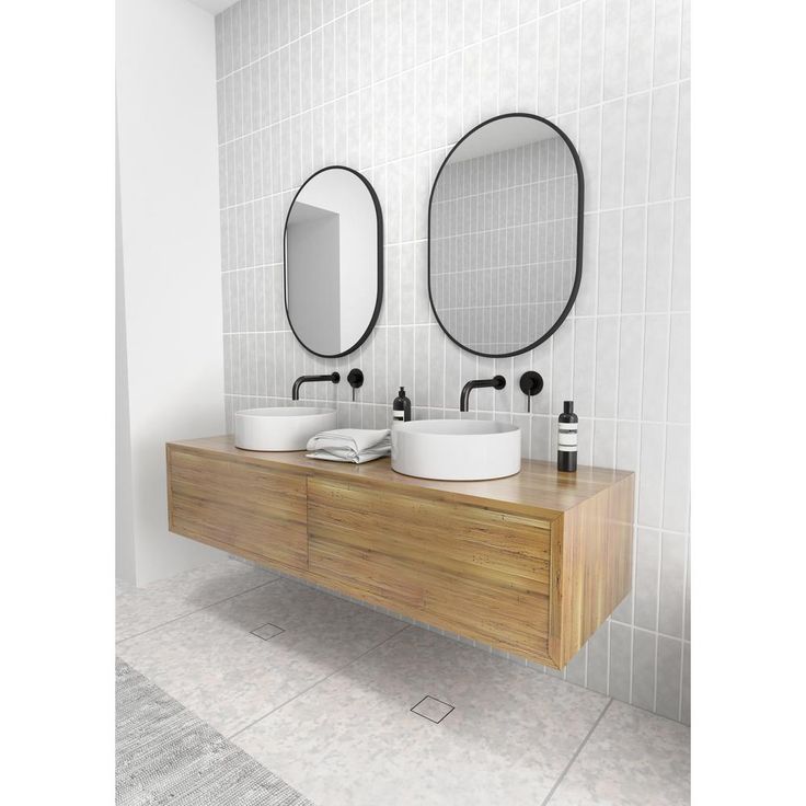28 in. x 20 in. Pill Shape Black Stainless Steel Framed Mirror