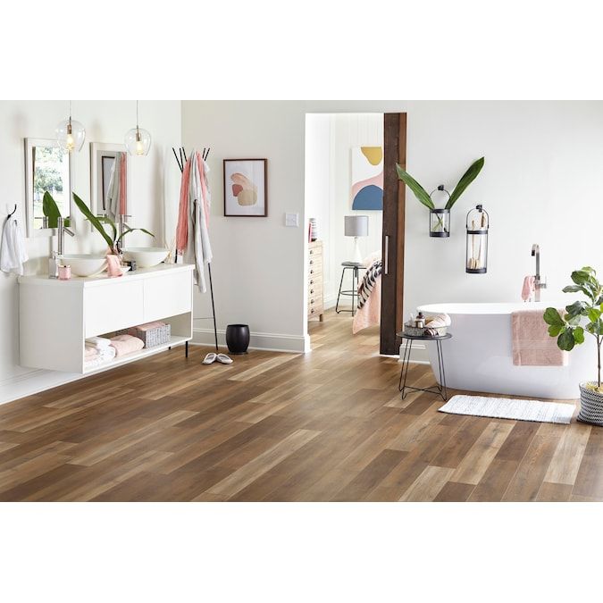 Style Selections Hickory Medley 12-mm T x 6-in W x 50-in L Water Resistant Wood Plank Laminate Flooring (17.07-sq ft / Carton)