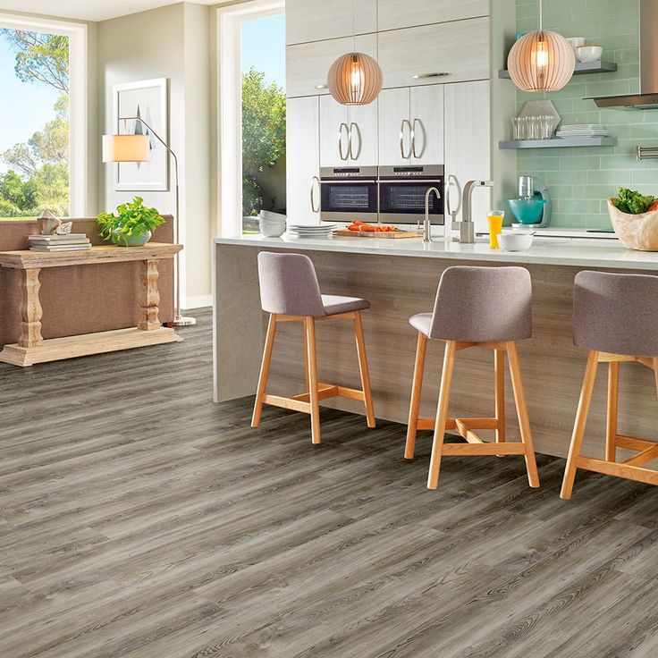 Armstrong Flooring Assurity Light Gray 20-mil x 7-in W x 60-in L Waterproof Interlocking Luxury Vinyl Plank Flooring