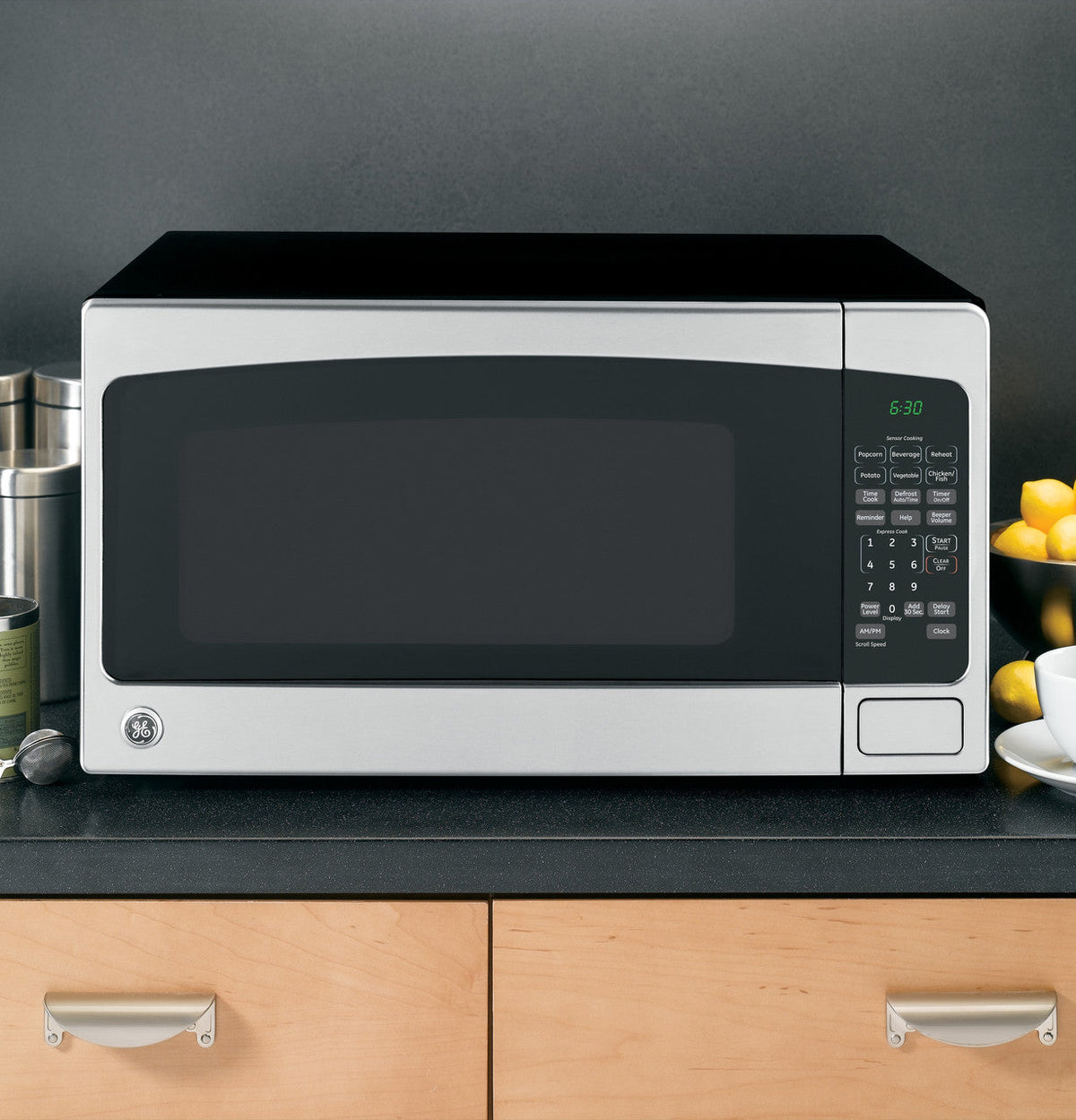 GE 2.0-cu ft 1200-Watt Countertop Microwave, Stainless Steel (JES2051SNSS)