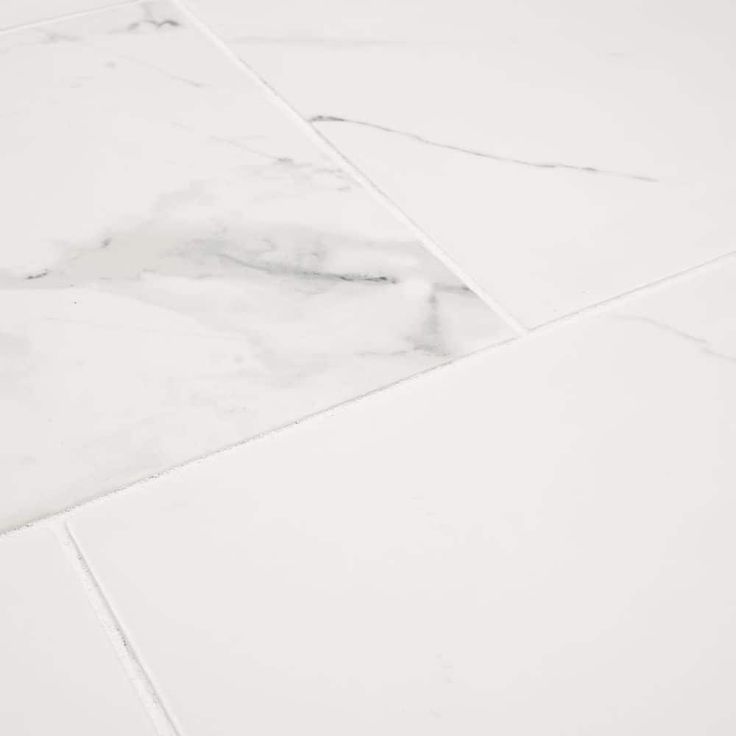 MSI 12 in. x 24 in. Carrara Polished Porcelain Floor and Wall Tile (16 sq. ft./case)