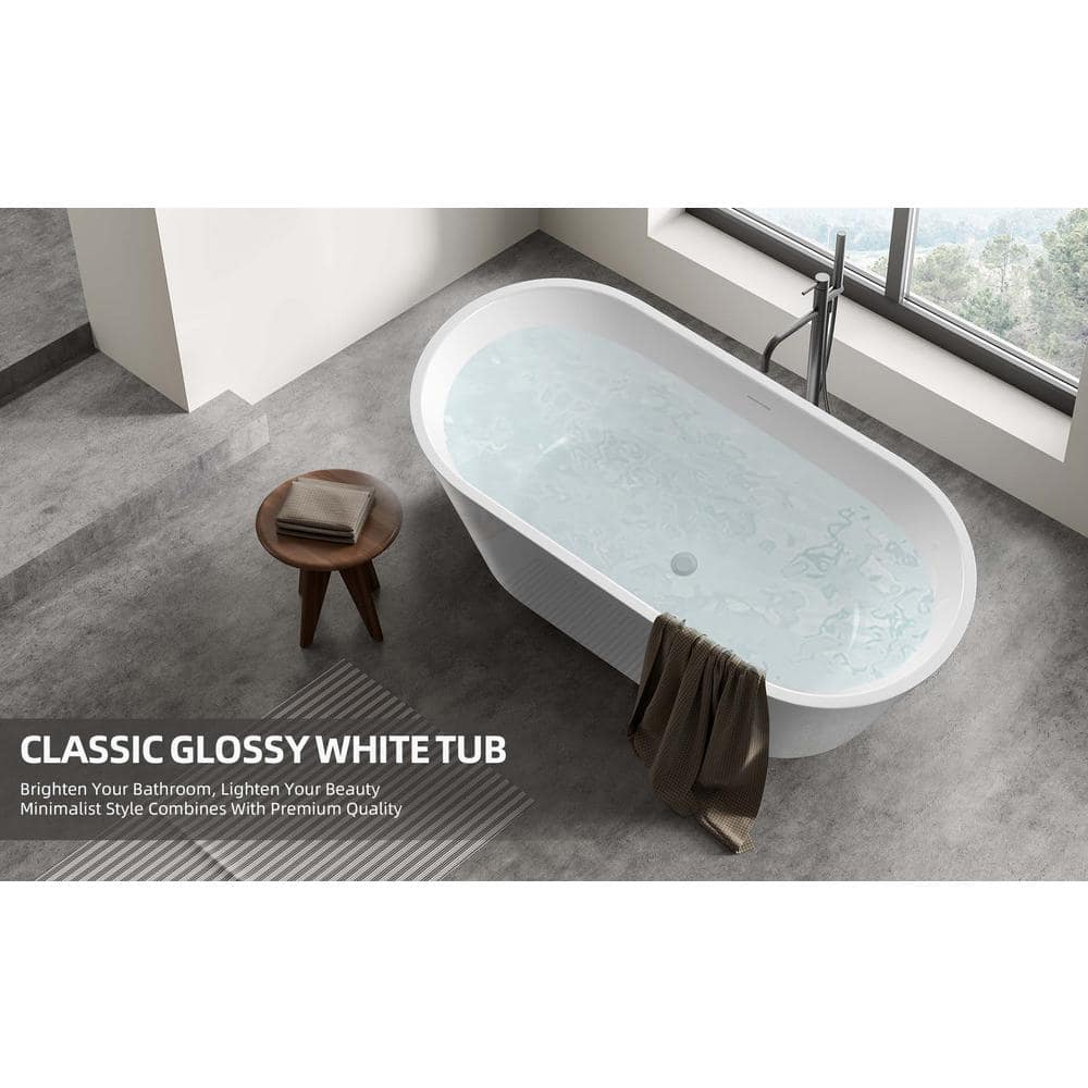 67 in. x 29.5 in. Oval Acrylic Freestanding Bathtub with Center Drain Flatbottom Free Standing Soaking Tub in White