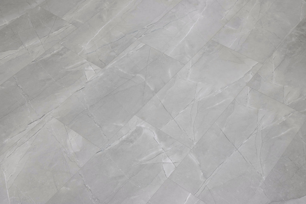 CALI Shorebreak Tiburon Marble 12-mm T x 11-13/16-in W x 23-5/8-in L Waterproof Tile Look Laminate Flooring (15.5-sq ft / Carton)