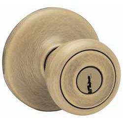 Kwikset Tylo Antique Brass Entry Knob, ANSI/BHMA Grade 3, Fits Doors to 1-3/4 in.