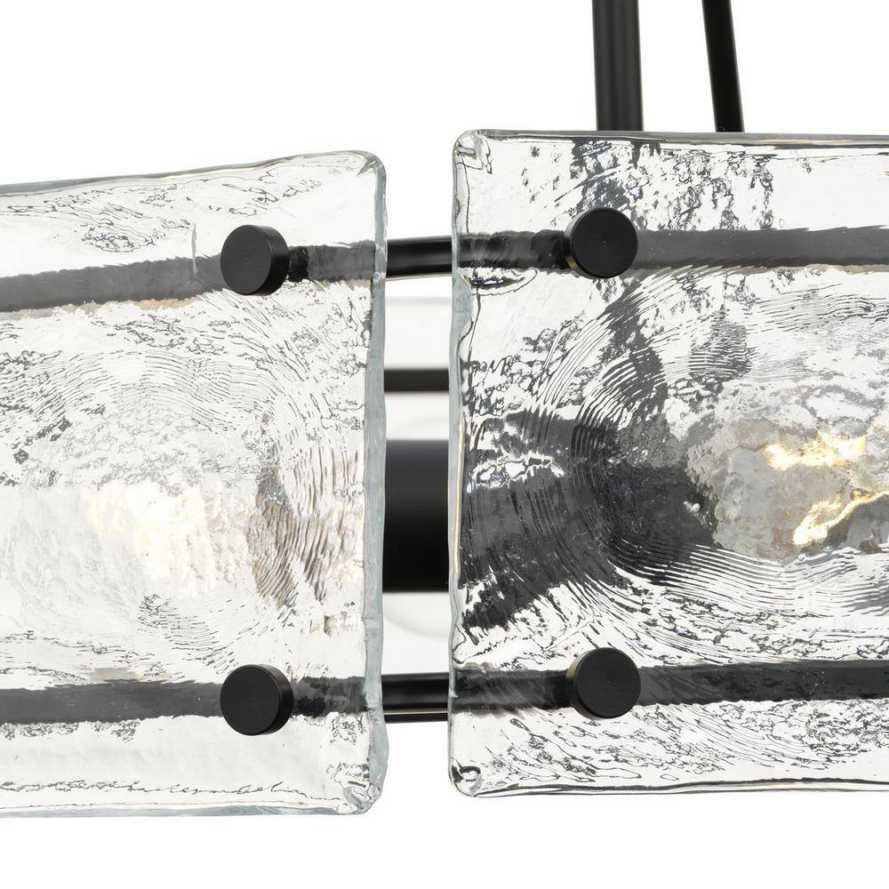 Progress Lighting Rivera 20.5 in. 4-Light Matte Black Luxe Industrial Chandelier with Textured Glass