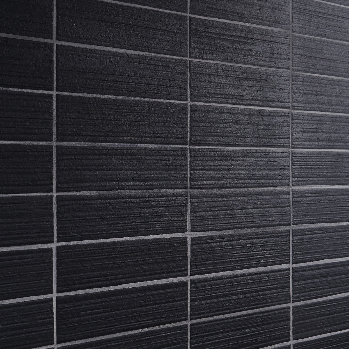 Charlotte Charcoal Black 3x10 Textured Matte Ceramic Subway Tile - Lux Tile