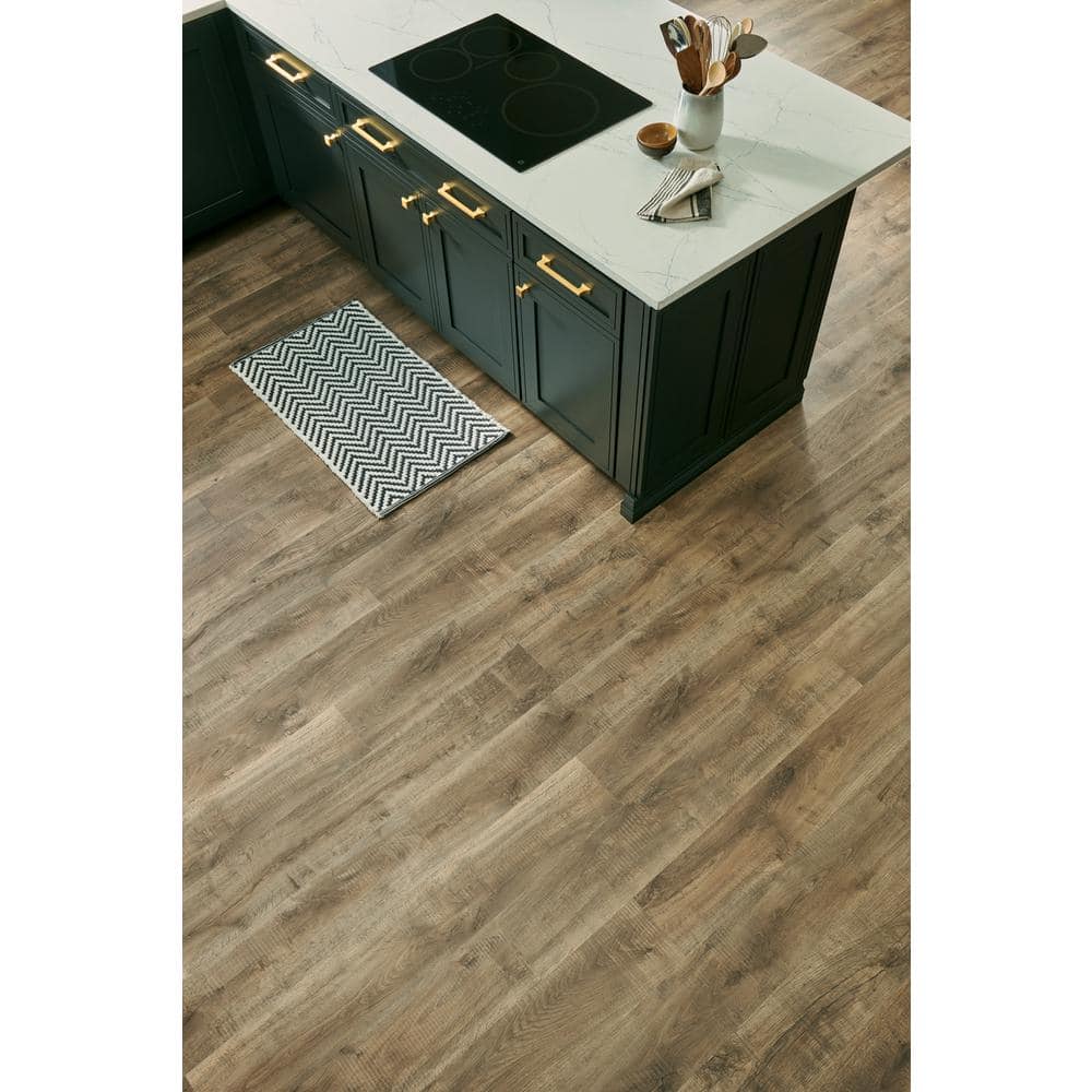 Pergo Defense+ Tanned Chester Oak 14 mm T x 7.4 in. W Waterproof Laminate Wood Flooring (17.18 sqft/case)