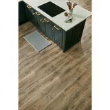 Pergo Defense+ Tanned Chester Oak 14 mm T x 7.4 in. W Waterproof Laminate Wood Flooring (17.18 sqft/case)
