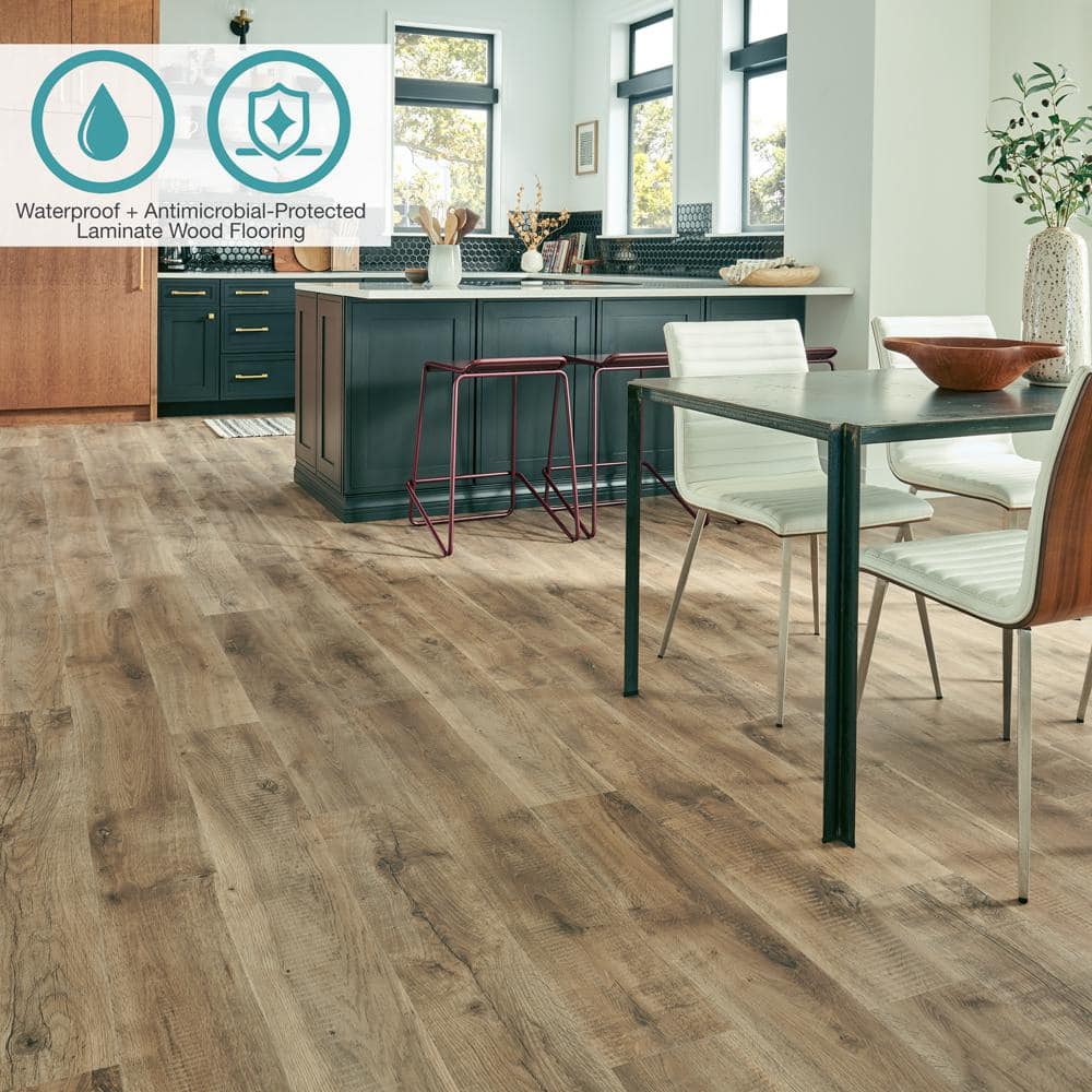 Pergo Defense+ Tanned Chester Oak 14 mm T x 7.4 in. W Waterproof Laminate Wood Flooring (17.18 sqft/case)